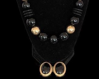 Necklace with 14 16m/m, 4 18m/m, 5 20m/m and 6 25m/m Black Onyx Beads.  4 Hammered 14K Gold Beads - 2 16m/m and 2 18m/m.  Pierced Earrings - 14K Gold and 26x18m/m Black Onyx Stone.