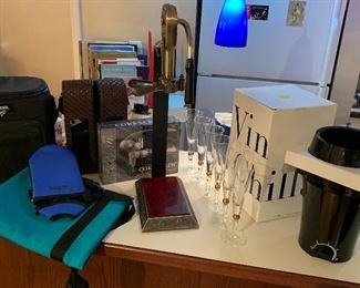 Vintners wine opener stand 24"H base-11"×6.5" cork wine bottle opener$75,
Vin Chilla chiller $25, 
Corkscrew kit $25, 
Champagne glasses $2 each