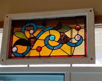 Old wood window frame with stained glass 