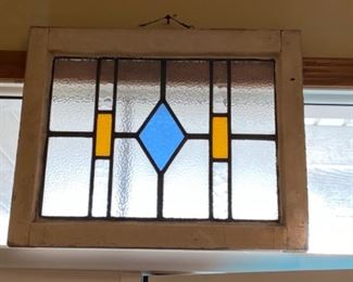Old wood window frame with stained glass