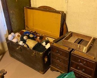Vintage travel chest filled with very old stuffed toys