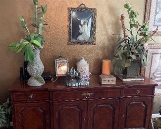 this piece can be used as a buffet, credenza or large TV stand.  