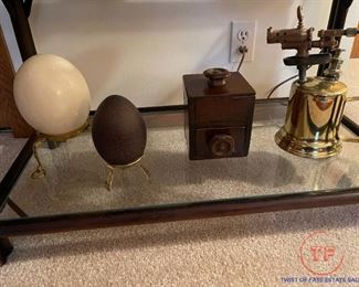 Antique Blow Torch, Coffee Grinder, and Ostrich Eggs on Stands