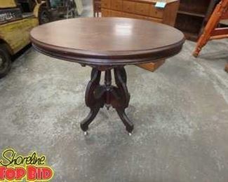 Antique Oval Display Table on castors