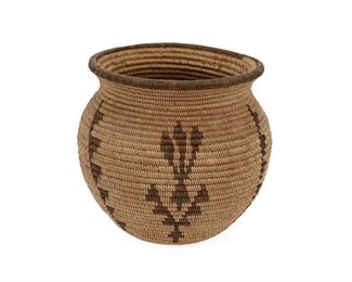 5002
A Chemehuevi Basket
First-Half 20th Century
The basket with three divided sections each featuring a foliate motif separated by vertical stacked elements
5" H x 6" W
Estimate: $800 - $1,200