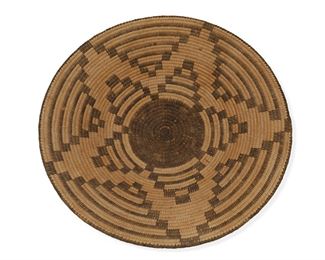 5007
A Pima Basketry Tray
First-Quarter 20th Century
With a five-pointed star radiating from black center finished with a herringbone edge
4" H x 15" Dia.
Estimate: $800 - $1,200