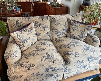 Sherrill Loveseat Upholstered in Blue Toile Fabric - 2 Available. Each measures 55" W x 38" D. Front & Cushions are in EXCELLENT condition but cat did scratch the top of the frame. Only noticeable if loveseat is floating in a room. Photo 1 of 4.