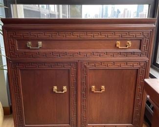 Vintage Hand-Carved, Custom Teak Cabinet with Brass Pulls. Measures 36" W x 18" D x 36" W. This photo represents true color. Excellent front & sides. Top needs refinishing. Photo 1 of 4.