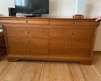 Vintage Marshall Field 10-Drawer Oak Bureau. Measures 64" W x 19" D x 33" H.