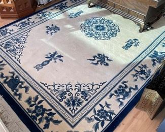 Blue & White Area Rug. Measures 5' x 8'.