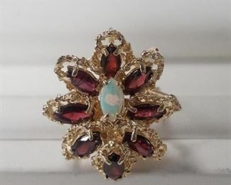 Beautiful opal and garnet ring