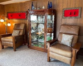 Large curio cabinet and vintage Stickley reclining chairs