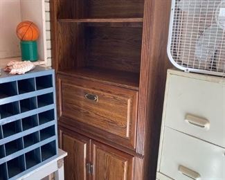 Large wood shelf cabinet
Not solid wood but is heavy. 
Has a little desk that folds down as well.
Good condition but needs to be cleaned.
Must be able to move and load yourself.