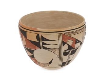 6050
A Hopi Pottery Bowl
20th Century
Signed indistinctly: Jo [illegible] / Two Hearts
The bowl with polychrome and avian motifs on buff burnished slip glaze
5.25" H x 6.5" Dia.
Estimate: $300 - $500