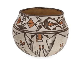 6061
A Zia Pottery Vessel
Second-Quarter 20th Century
The wide mouth vessel with polychrome geometric motifs within an upper band and lower register on a white burnished slip glaze
5.5" H x 7" Dia.
Estimate: $300 - $500