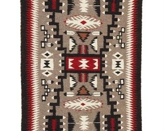 6072
A Navajo Regional Storm Pattern Rug
20th Century, Diné
Woven in black, red, cream, grey, and green wool with an all-over geometric storm pattern
42.5" L x 26.5" W
Estimate: $400 - $600