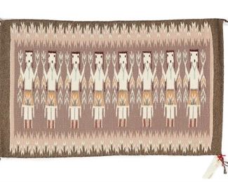 6085
A Navajo Yei Weaving, By Rita Totsoni
Fourth-Quarter 20th Century, Diné
Woven in polychrome wool with eight Yei figures
23.5" H x 37" W
Estimate: $200 - $300