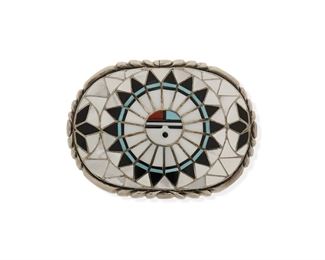 6138
A Zuni Inlaid Sterling Silver Belt Buckle
Second-Half 20th Century
Stamped: RLK [for Ralph and Lillie Kallestewa] / Sterling
A multistone inlaid Sun Face buckle, including mother of pearl, turquoise, onyx, and coral
2.5" H x 3.5" W
97.3 grams
Estimate: $200 - $300