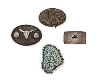 6142
A Group Of Southwest Jewelry
Fourth-Quarter 20th Century
Four works:

A Navajo turquoise slab buckle bezel set within a twisted wire and incised frame
Stamped: Tony Guerro [Diné]
2.5" H x 3.25" W

A silver oval buckle centering a steer skull
Stamped: Ken's Jewelry / Sterling
2.5" H x 3.5" W

A desert themed oval silver buckle
Signed: R. Collins / © / Sterling
2.375" L x 3.25" W

A rectangular silver buckle with centered stone set lapis lazuli
Stamped: W / Yellowhorse / Sterling
1.5" H x 2.5" W

4 pieces
287.8 grams gross
Estimate: $500 - $700