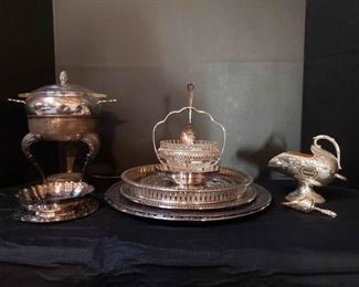 https://ctbids.com/estate-sale/13112/item/1131322 Unique Silverplated Serving Pieces: Oneida, Raimond, & More
Very cute and unique Raimond dish and scoop along with numerous other pieces. Several do have inscriptions. Largest tray is approximately 12" in diameter. (The reflection of wood is visible in some photos.)