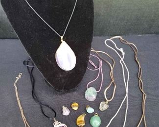 https://ctbids.com/estate-sale/13112/item/1139491 Collection Of Gemstone Necklaces And Pendants
All your favorite colors and stones are in this collection of necklaces and pendants. The longest necklace measures 28"L and the shortest measures 18"L. Largest pendant measures 1 1/2"h x 1"L and smallest measures .25"L.