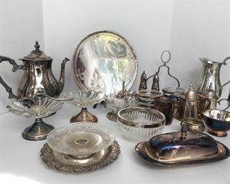 https://ctbids.com/estate-sale/13112/item/1172402 Collection of Silver Serving & Decor Items
A nice collection of non-sterling silver pieces. Community White Orchid salt, Schlosser Fine Jewelry, EPNSAI, Towle, Meridan and unmarked items. Includes coasters, candle sticks, teapot, pitchers and more. 