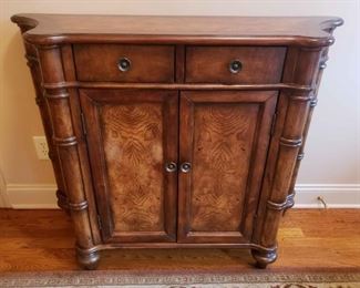 https://ctbids.com/estate-sale/13112/item/1187465 Gorgeous Burlwood Entry Table
This distinctive piece is a wonderful example of burlwood. Intricate detail and curved sides. This cabinet measures 36.5" tall, 45.5" at it's widest width, 32" width in the front and 15.5" in depth.