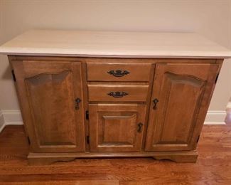 https://ctbids.com/estate-sale/13112/item/1187553 Canadel Credenza
This credenza is made by Canadel. Made in Canada. The manufactured wood top matches the breakfast table top. This piece measures 48" in length, 18" in depth, and 33" in height. Contents of the credenza is not included.