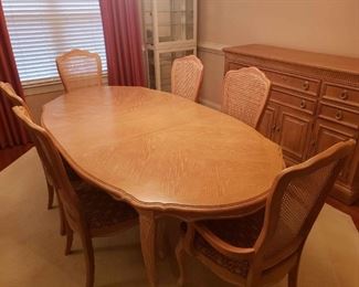 https://ctbids.com/estate-sale/13112/item/1188054 Elegant Dining Table & Six Chairs
This is an elegant dining room table with six matching chairs. Two chairs have arms fir the head of the table. A fitted protective cover comes with this lot as well as an leaf extension (photographed separately). The table already has one extension in it. The table with one extension measures approximately 82" long, 43.25" in width and 29.5" in height. The back of the chairs measures 41.5" and the seat measures 18.5" in width. The additional leaf would add another 16" in length. 