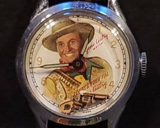 https://ctbids.com/estate-sale/13112/item/1216569 Vintage Gene Autry watch, copyrighted in 1948. Watch is not working at the current time. In working condition, the pistol moves up and down by the second. 
