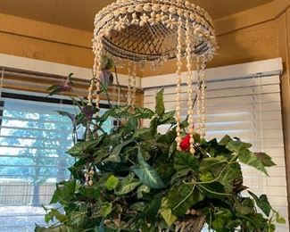 One of four shell / macrame hanging planters