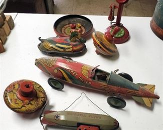 Antique Tin Litho Toys Including Wind Up Rocket Racer Wind Up Duck, Phone, Blimp And More