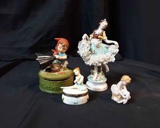 One Music Box And Four Figurines