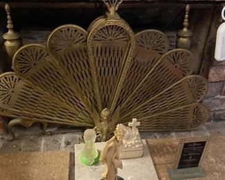 Brass fan type fireplace cover
