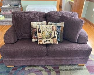 Eggplant Colored Upholstered Love Seat w/Pillows
