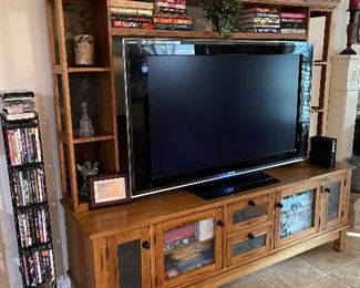 Big wooden entertainment center - 56” tv - I think! Cds dvds and books