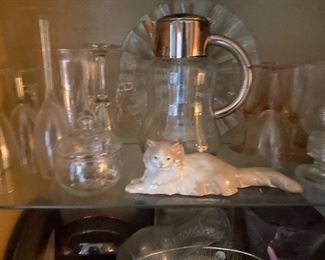 Porcelain cat and glasses