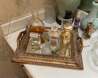 Antique perfume bottles with tray