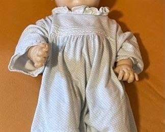 Effanbee doll c1930s-1940s. Rubber body. Straight legs. Eyes work well that go to sleep when horizontal. Doll is in good, age-expected condition. 