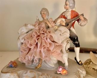 $50 Porcelain musician and seated lady 