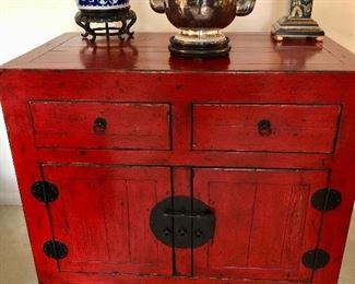 Dramatic red oriental chest