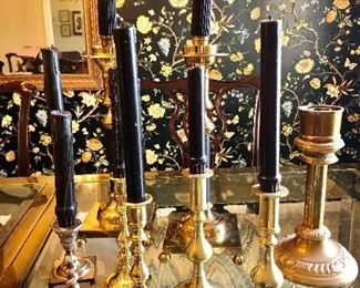 Collection of brass candle sticks