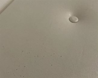 detail - please note the marks which are more like tiny punctures