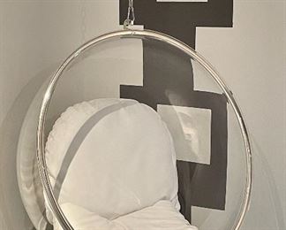 Item 40:  Lucite Hanging 'Bubble Chair' designed by Eero Aarnio with Chrome Accents and white cushions - 40.5"l:  $525