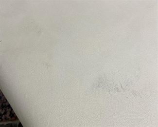 detail - please note marks on leather