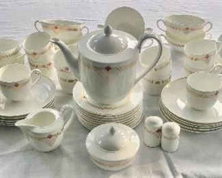 Item 254: Heinrich Villeroy and Boch "Origo" Bone China - two serving bowls with lids, 10 chowder or consomme bowls, one coffee pot, cream and sugar, salt and pepper and nine salad: $175
