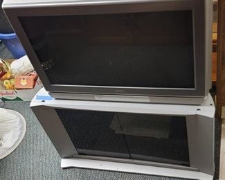 Toshiba big back TV w/remote & swivel TV stand w/glass doors