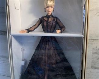 NIB Nolan Miller Cotoure Sheer Illusion Barbie
First in a Series