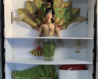 NIB Fantasy Goddess of Asia Barbie 
 Ltd. Edition
Description
First in a Series of Limited Edition International Barbie Dolls by Bob Mackie
Reproduction of Bob Mackie’s Original Signed Fashion Illustration Inside