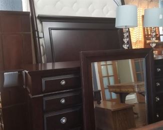 Beautiful bedroom suite.  King bed with triple dresser/mirror and 2 night stands.